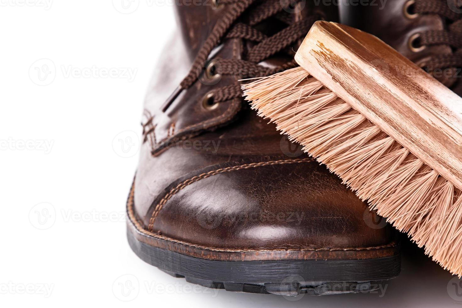 Brush and leather boots photo