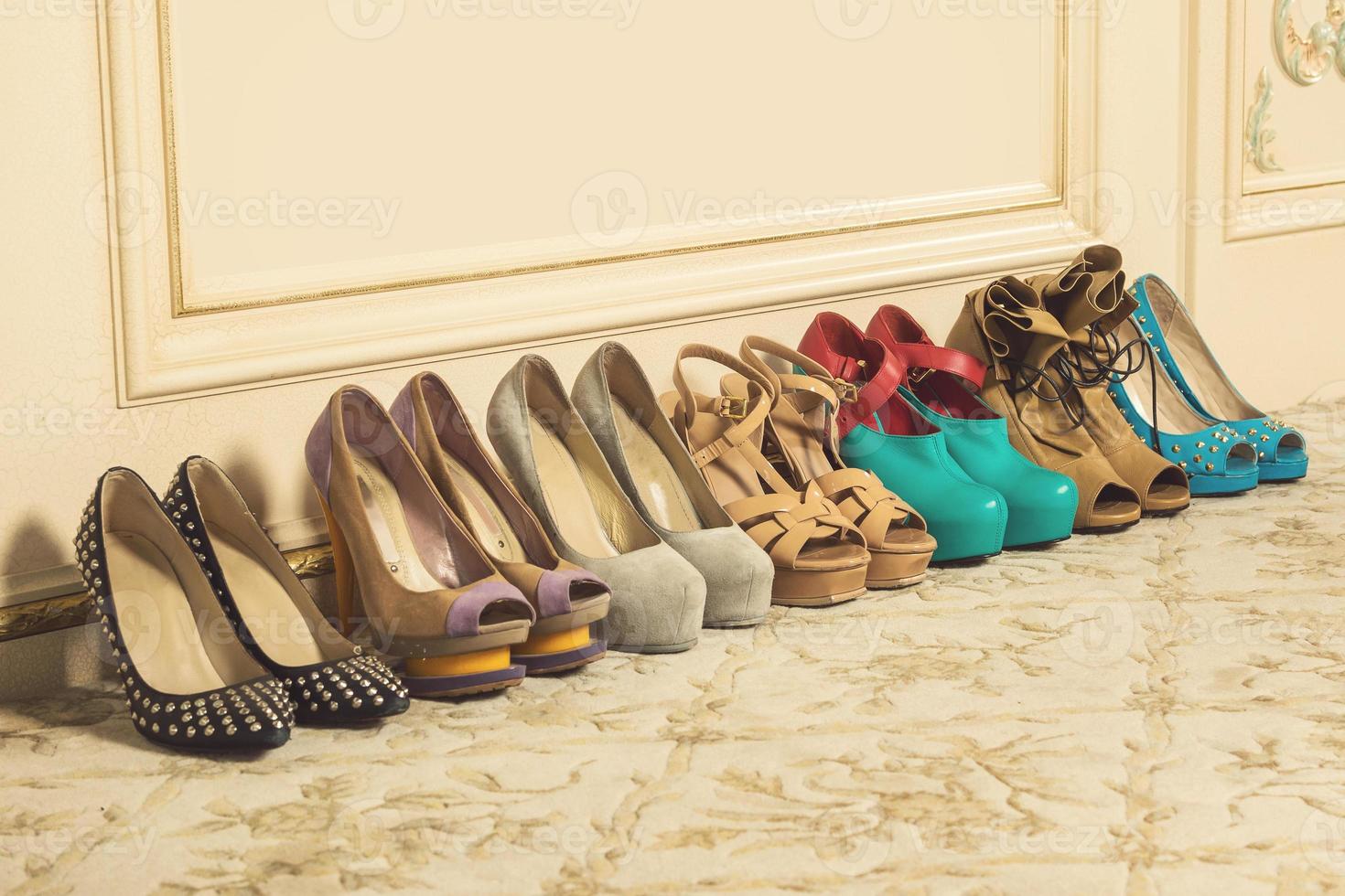 Different female shoes on high heels photo