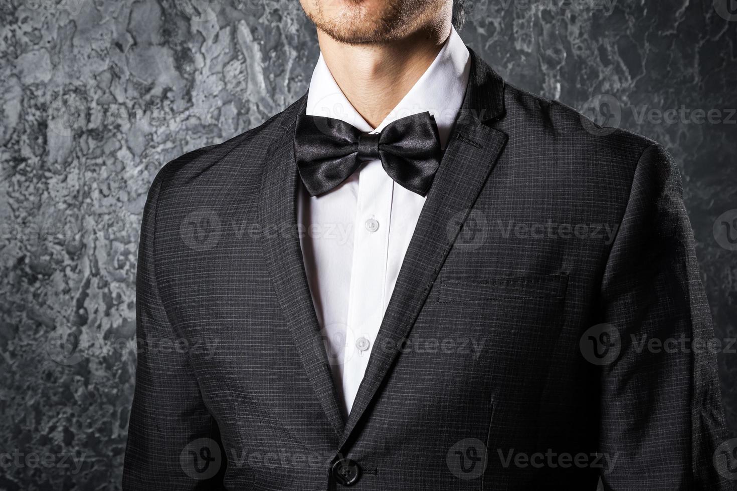 Man wearing bow tie photo