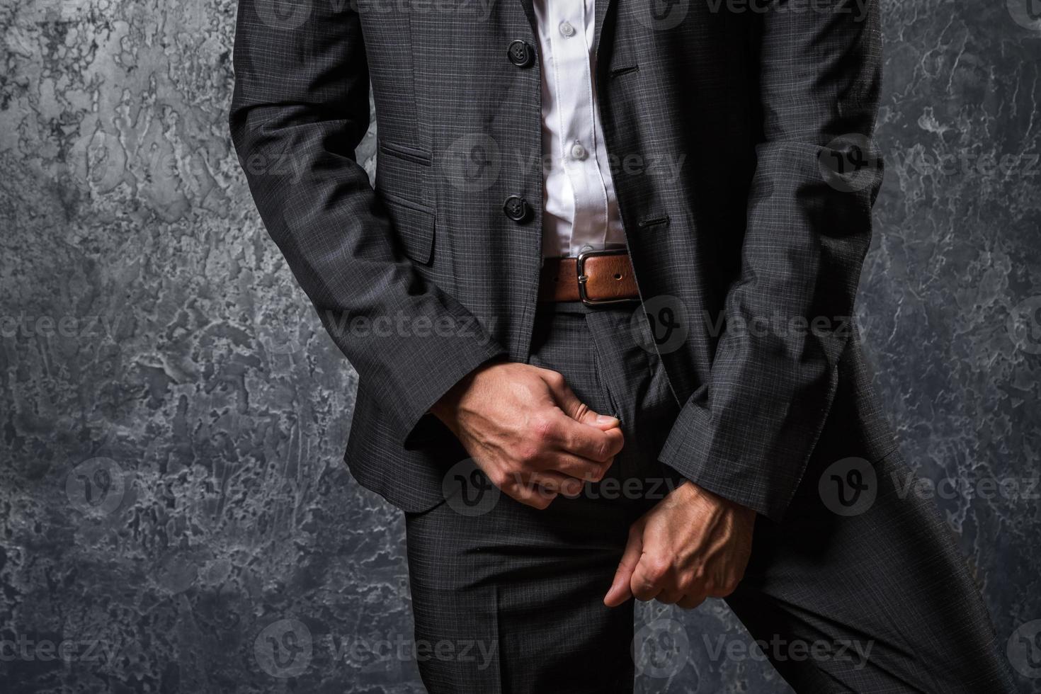 Man zip his pants up photo
