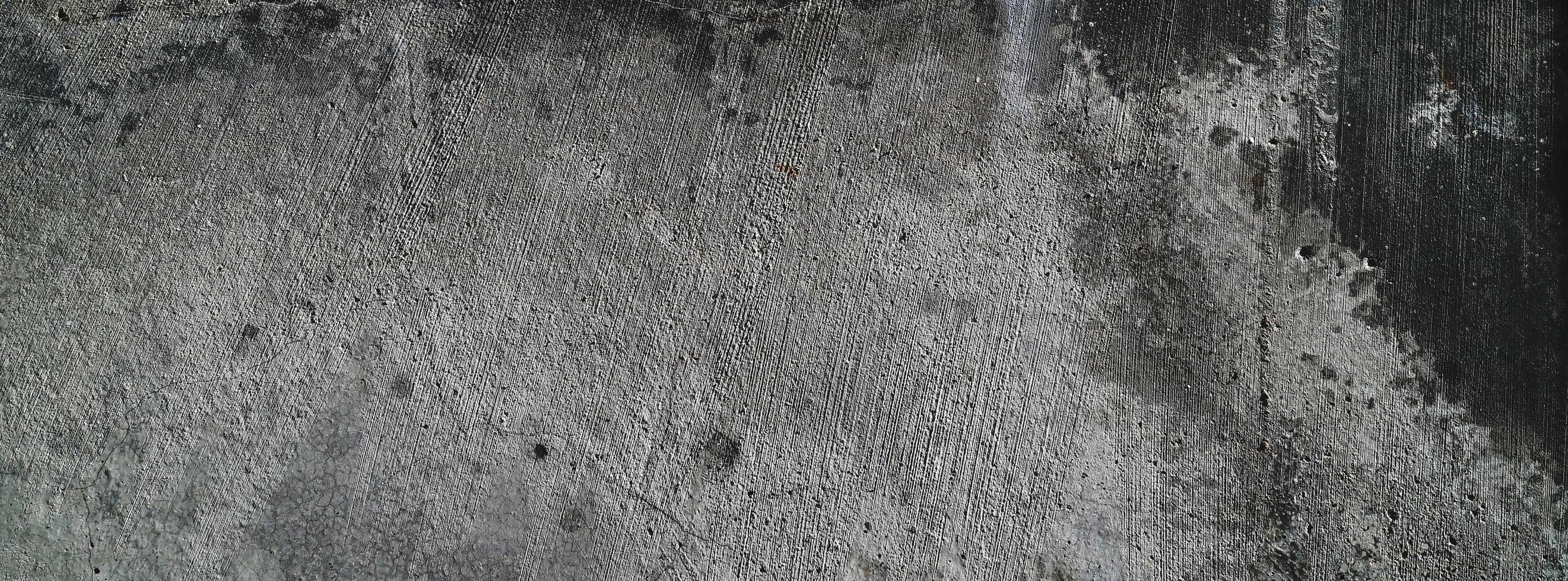 Old wall background.concrete wall plastered grey scratch background.grunge texture. photo