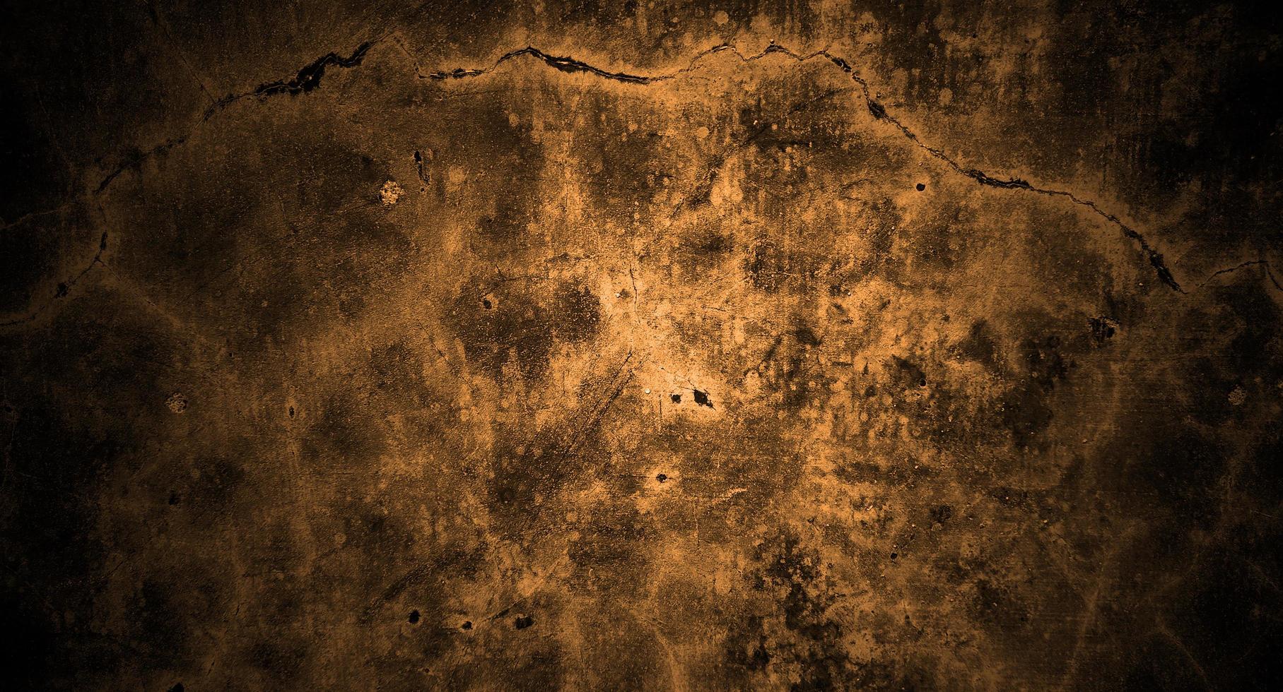 Dark yellow concrete scary for background. Yellow wall halloween background concept. Horror cement texture photo