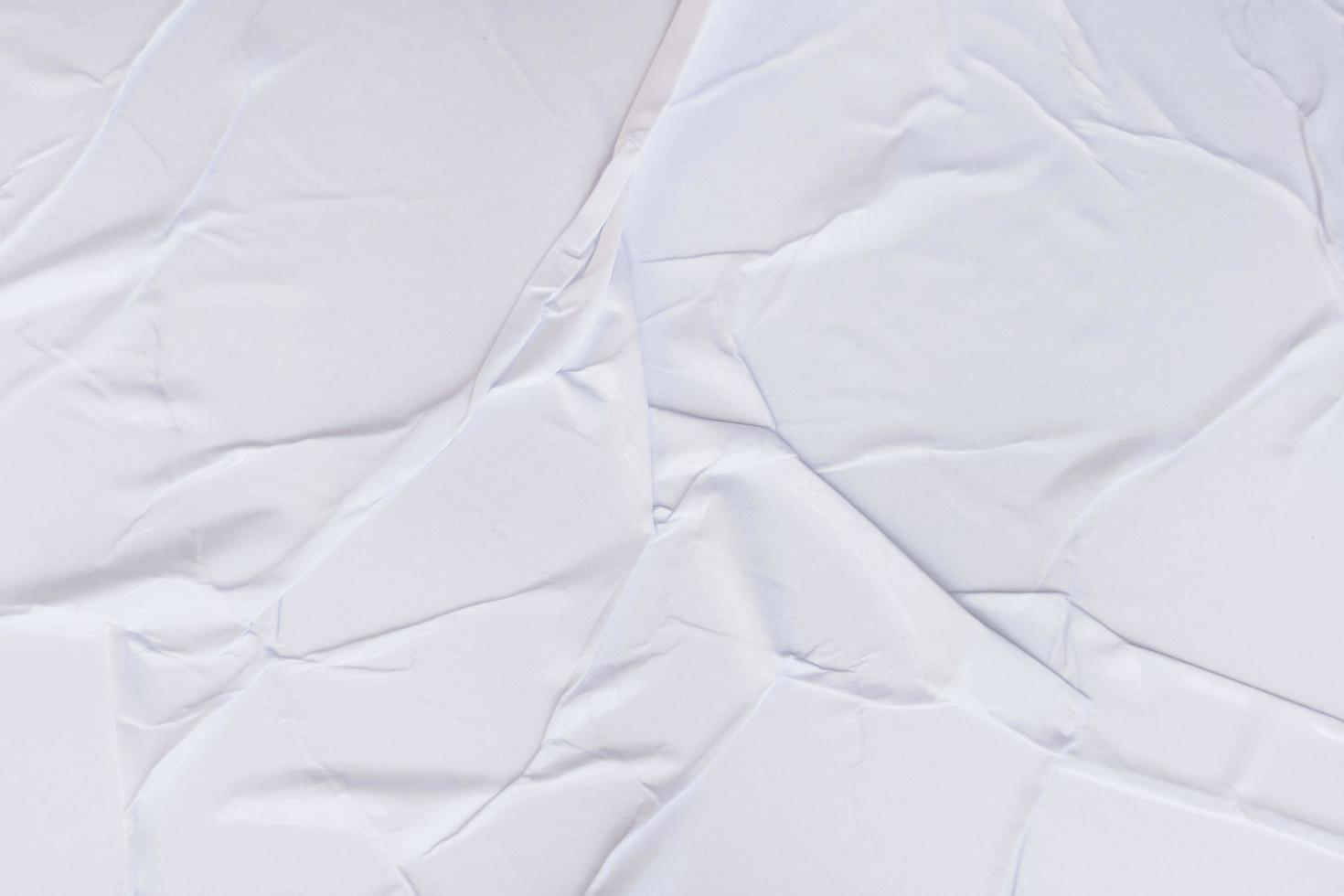 Blank paper crumpled texture and creased paper poster background. Wet crumpled paper texture backgrounds for various purposes. Realistic posters Paper crumpled texture background. photo