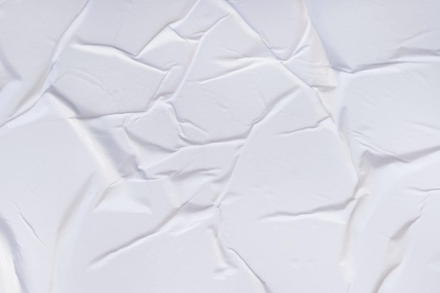 Blank paper crumpled texture and creased paper poster background. Wet crumpled paper texture backgrounds for various purposes. Realistic posters Paper crumpled texture background. photo