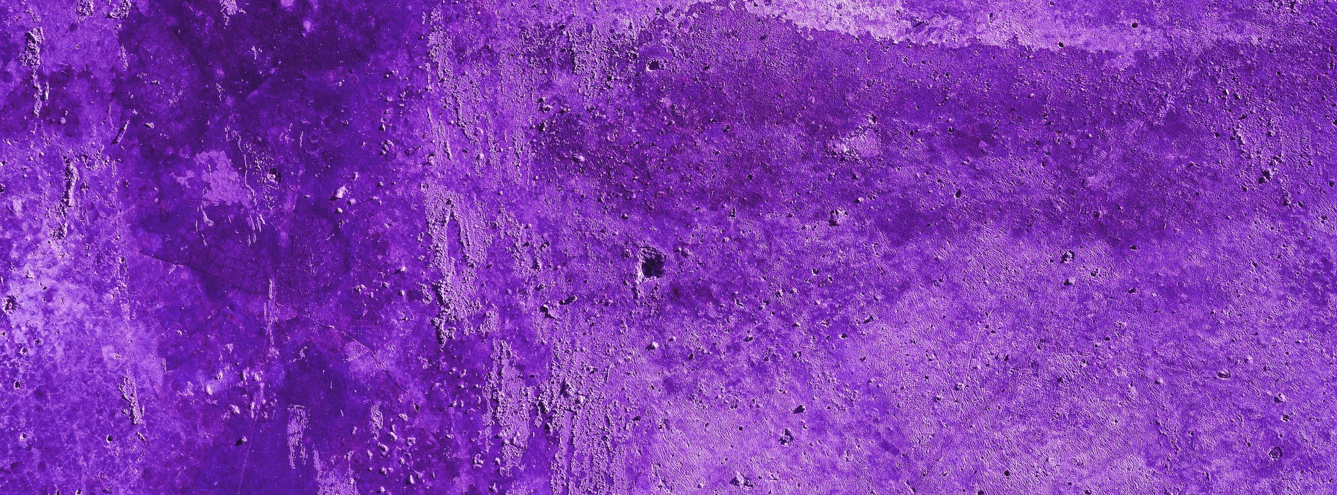 Purple wall background.concrete wall plastered purple scratch background.grunge texture. photo