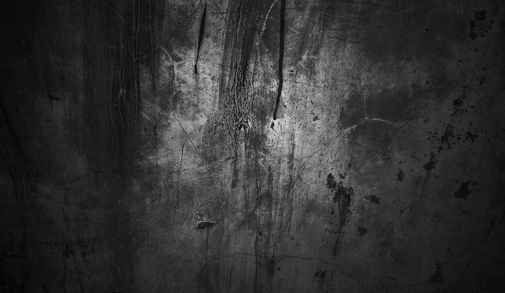 concepto de fondo de halloween de pared oscura y negra. hormigón negro polvoriento para el fondo. textura de cemento de terror foto