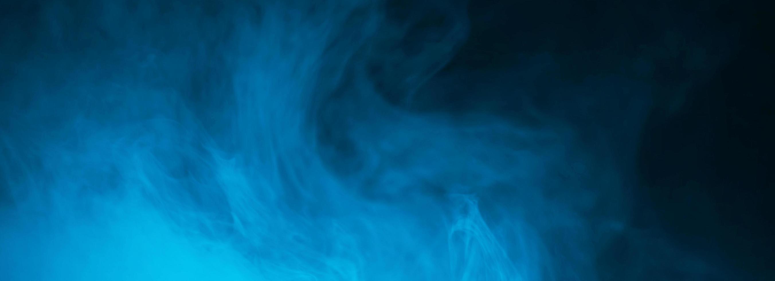 humo iluminado en el fondo. textura de humo abstracto para el fondo foto