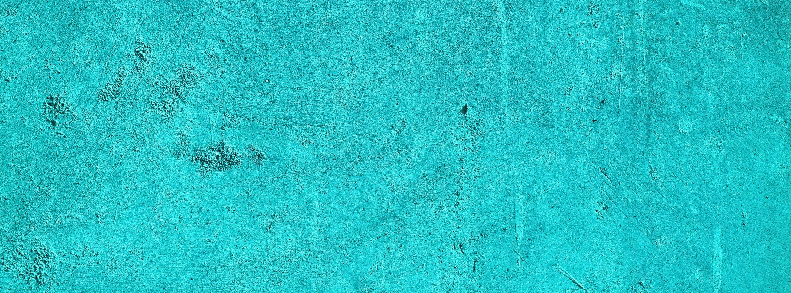 Blue wall background.concrete wall plastered blue scratch background.grunge texture. photo