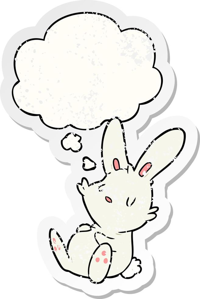 cartoon rabbit sleeping and thought bubble as a distressed worn sticker vector