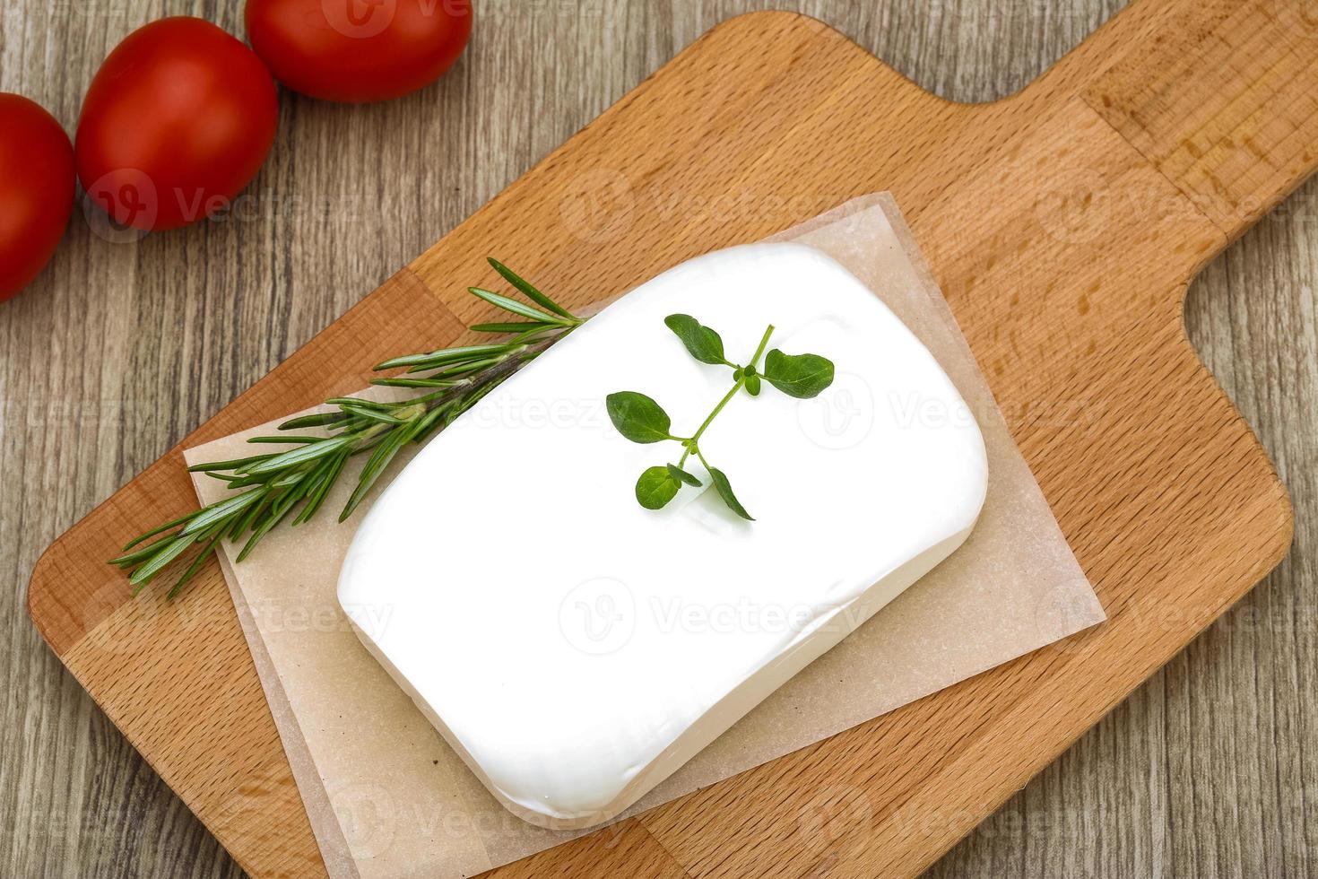 Feta cheese on board photo
