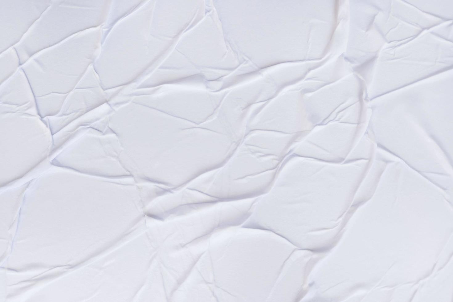 Blank paper crumpled texture and creased paper poster background. Wet crumpled paper texture backgrounds for various purposes. Realistic posters Paper crumpled texture background. photo