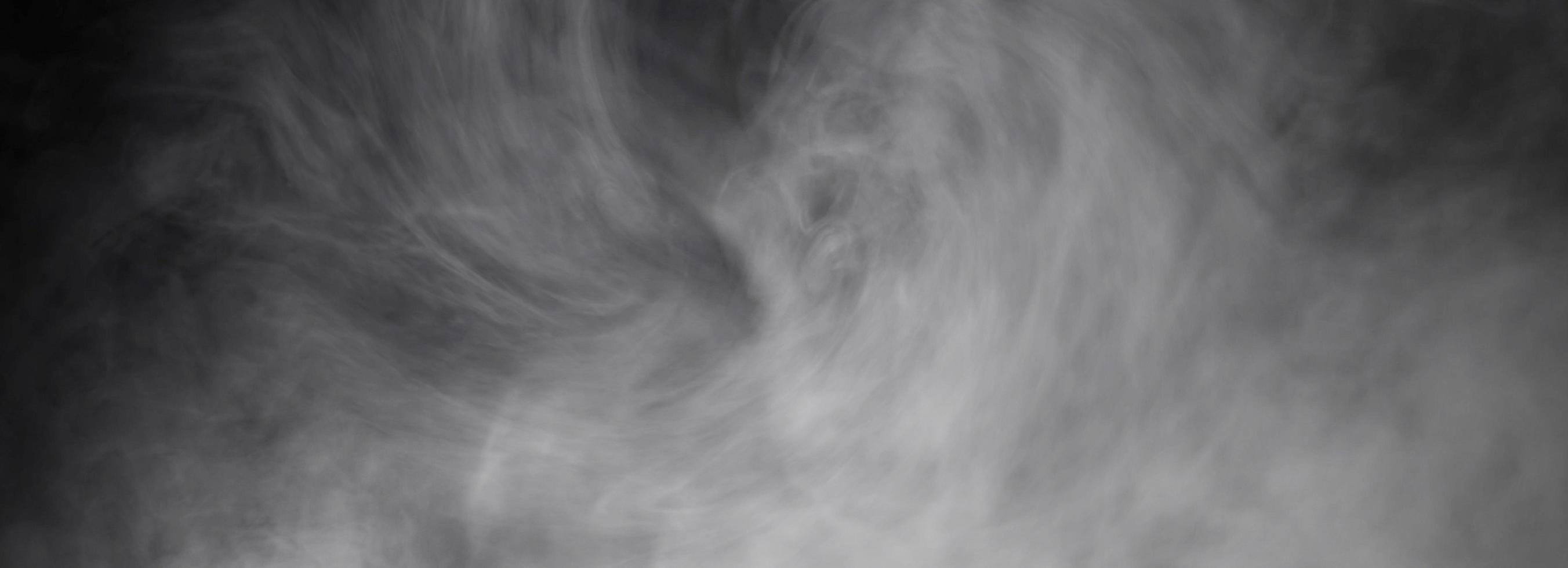 humo iluminado en el fondo. textura de humo abstracto para el fondo foto