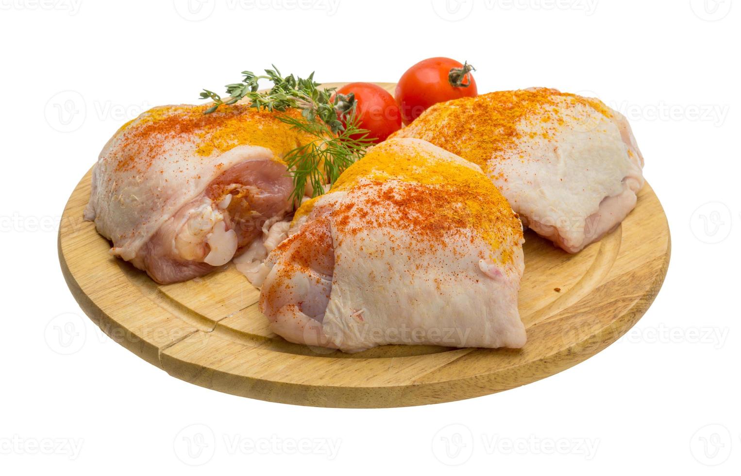 Raw chicken thigh photo