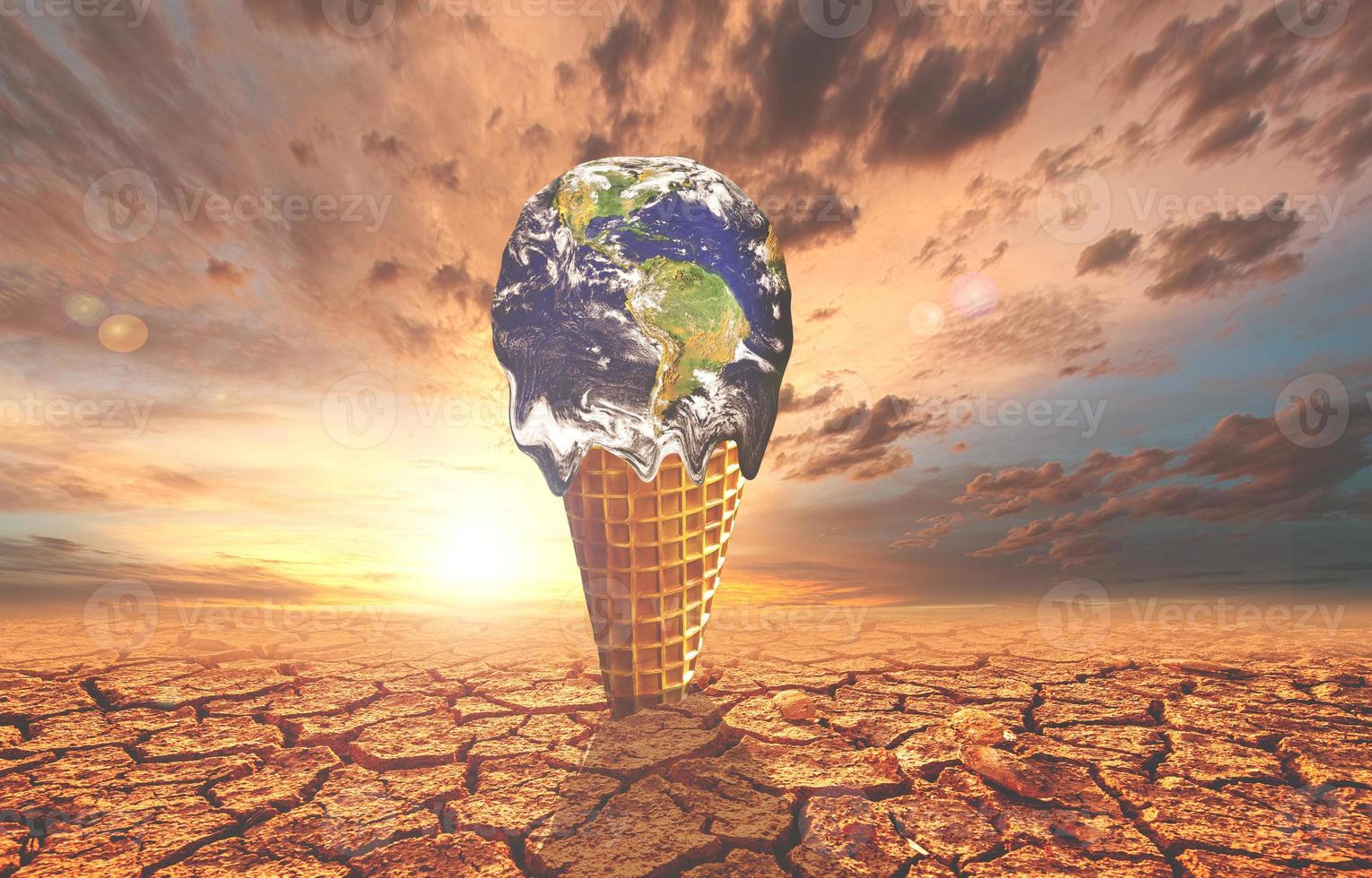 The concept of global warming and environmental change. Melting world on ice cream cone photo