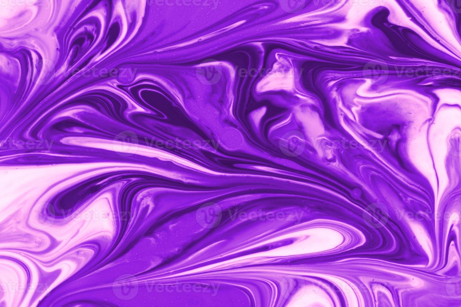 Purple background from liquid and color combinations photo