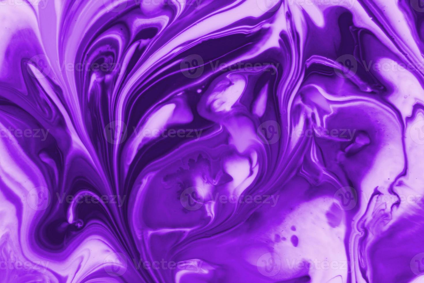 Purple background from liquid and color combinations photo