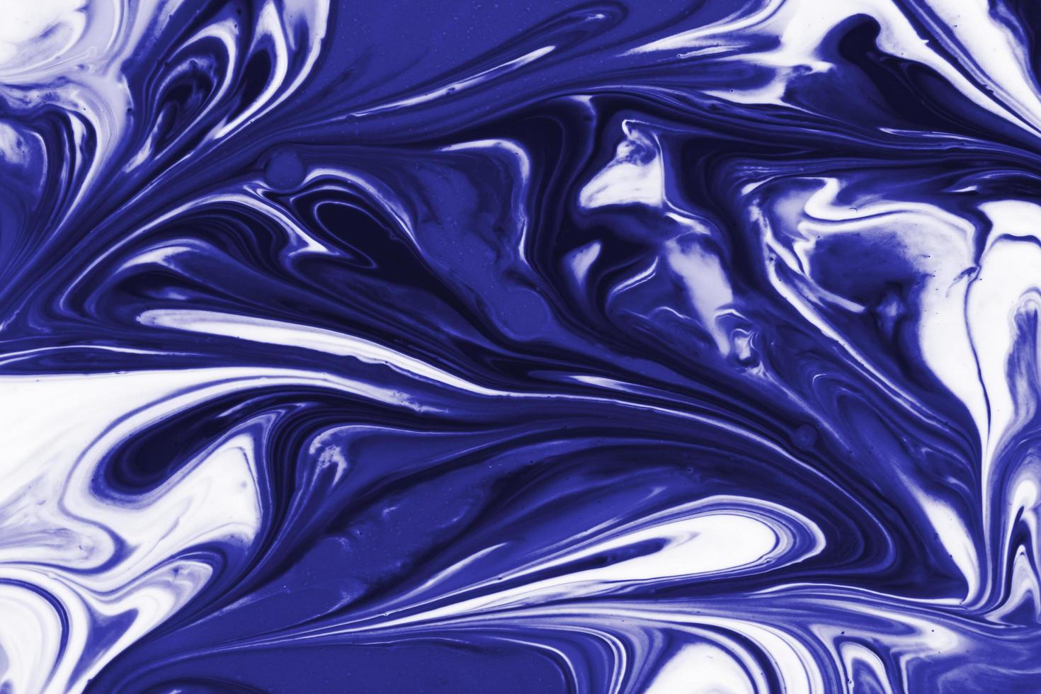 Purple background from liquid and color combinations photo