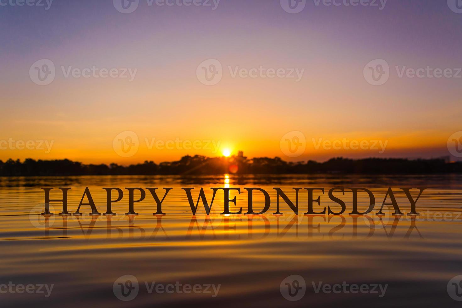 HAPPY WEDNESDAY with sunset water , twilight time photo