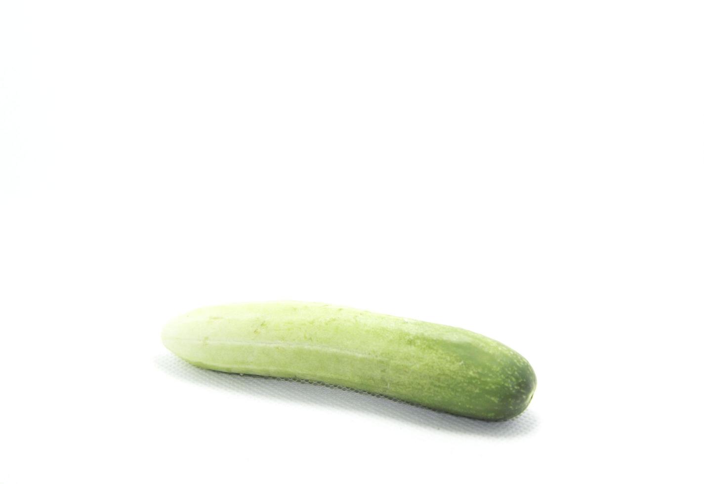 Green cucumbers are sweet and crispy, planted organically for health and body on a separate white background. photo