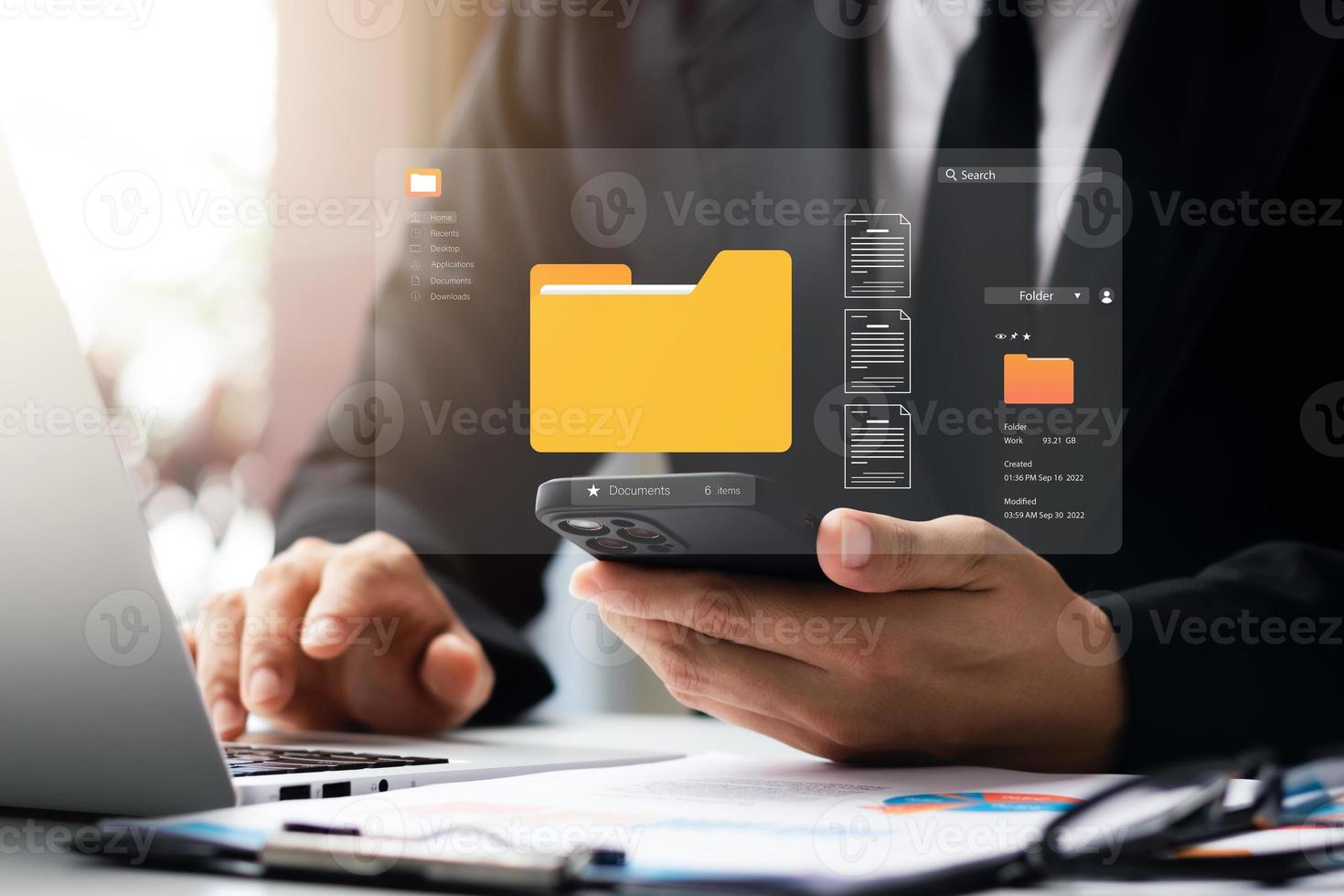 Document management system concept, business man holding folder and document icon software, searching and managing files online document database, for efficient archiving and company data. photo