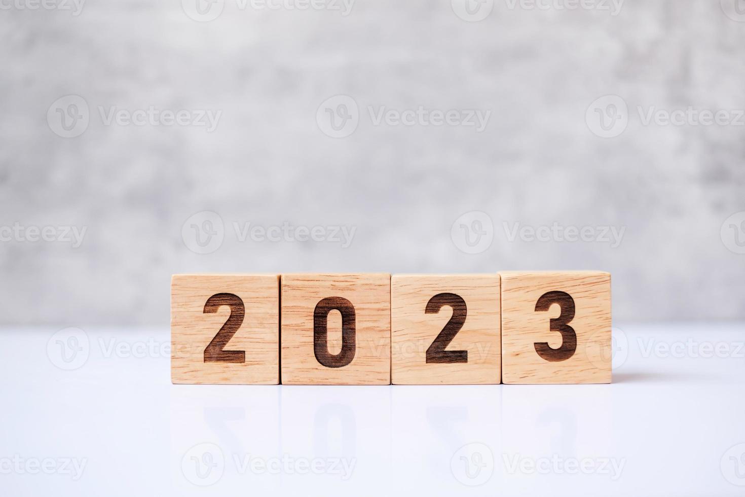 2023 year block on table. goal, Resolution, strategy, plan,, start, budget, mission, action, motivation and New Year holiday concepts photo