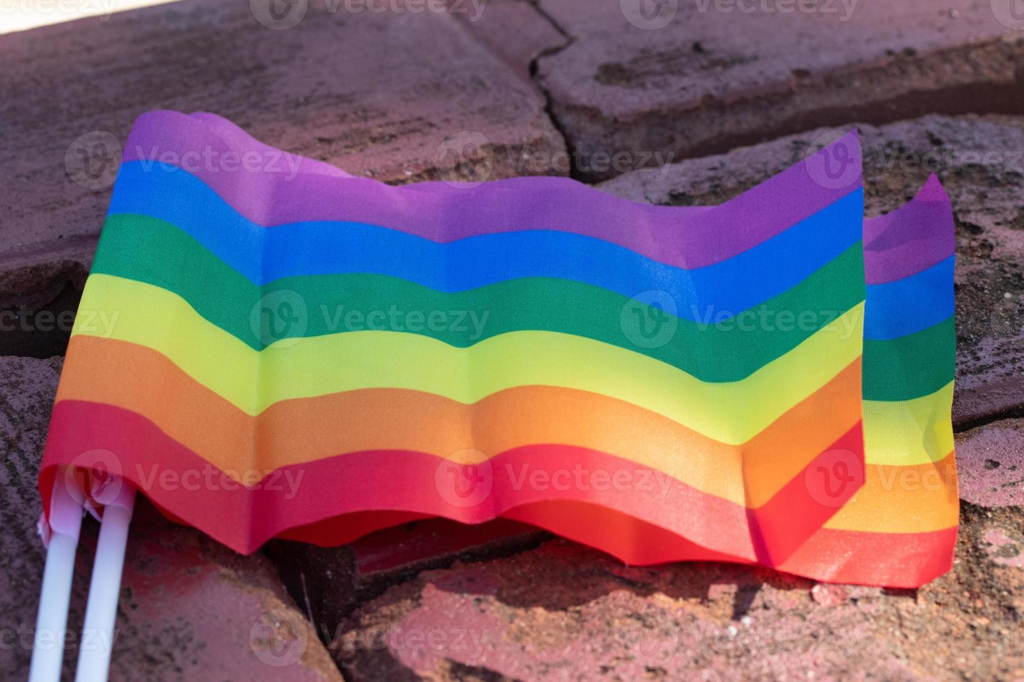 rainbow flags background, concept for lgbtqcelebrations in pride month photo
