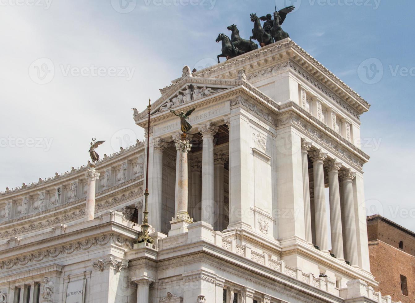 Equestrian monument to Victor Emmanuel II near Vittoriano at day in Rome, Italy photo