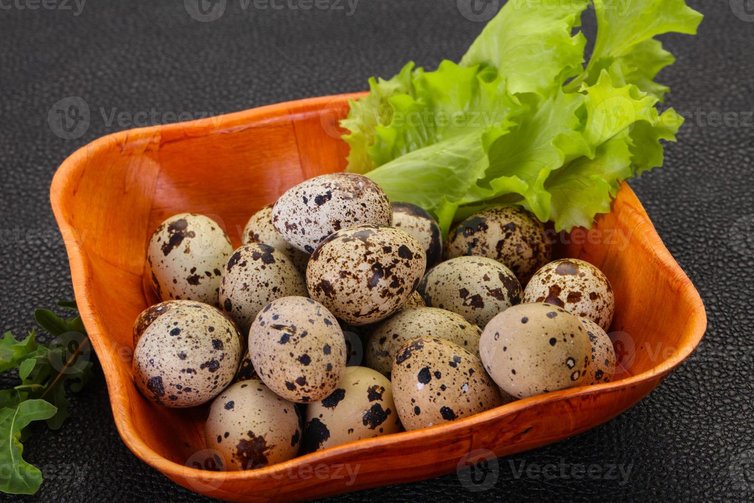 Quail eggs in the basket photo