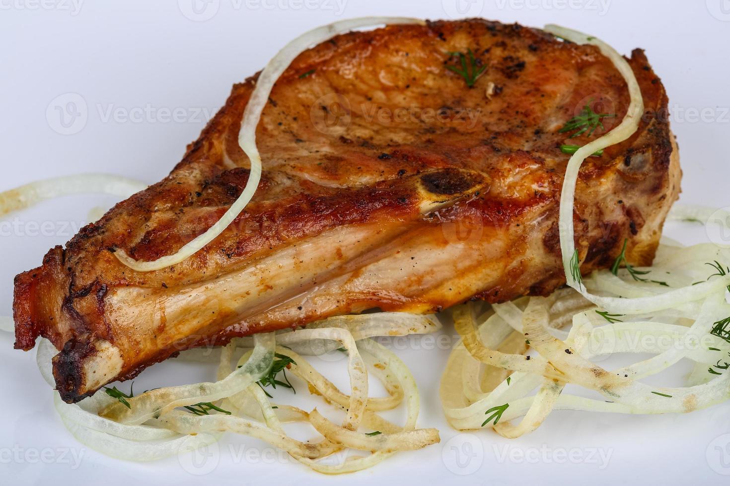 Grilled pork on the plate photo