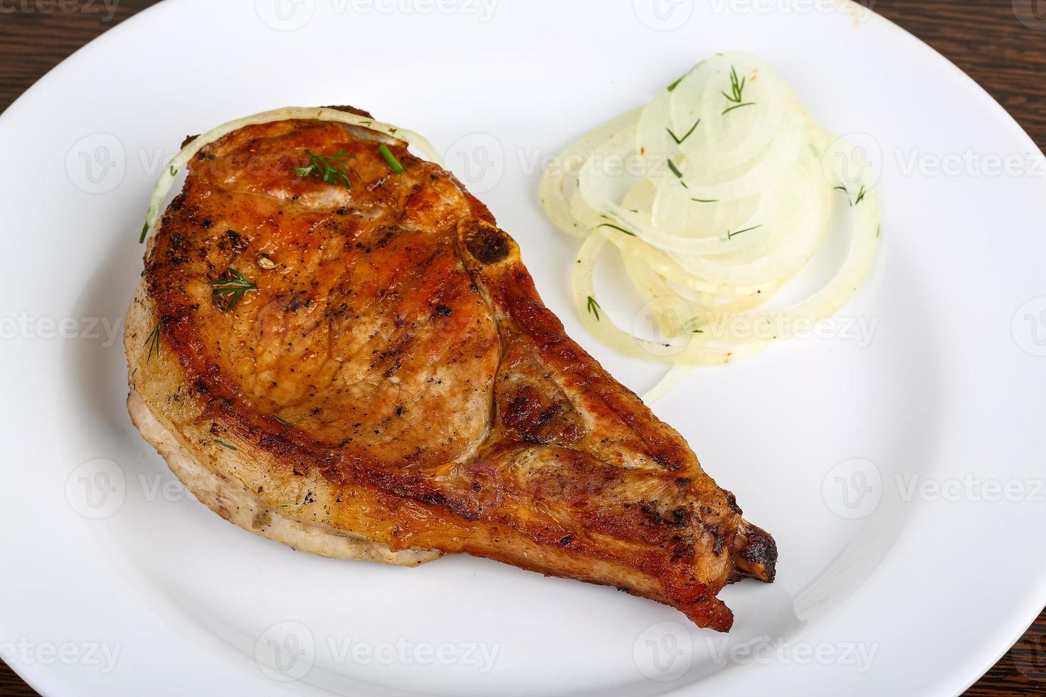 Grilled pork on the plate photo