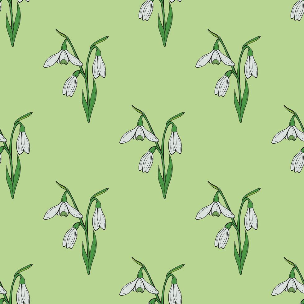 Seamless background with lovely snowdrops on light green background. Endless vector flowers pattern for your design.