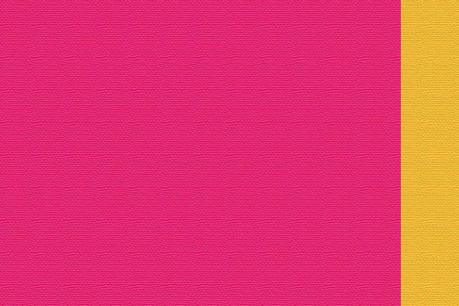 Textured pink backdrop with a pop of orange color on the side and space for text photo