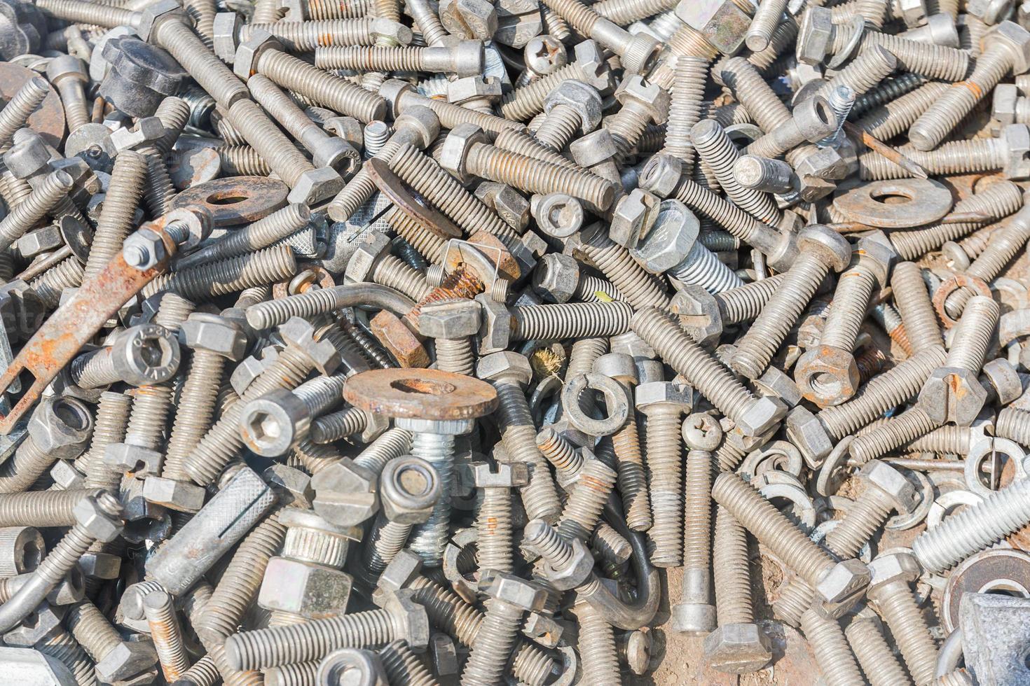 Close up of different old bolts,screw and nuts photo