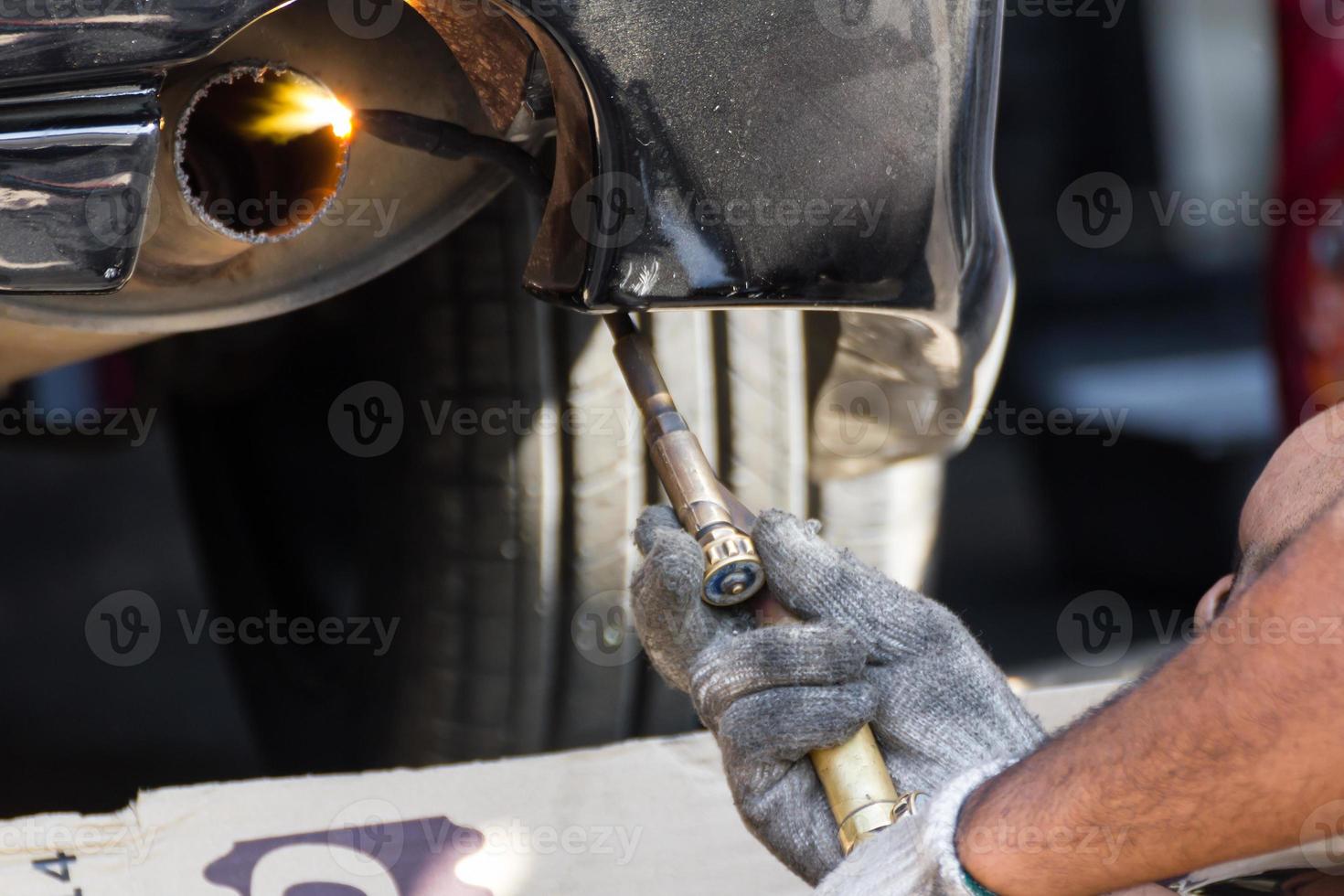 Repairing exhaust pipe photo
