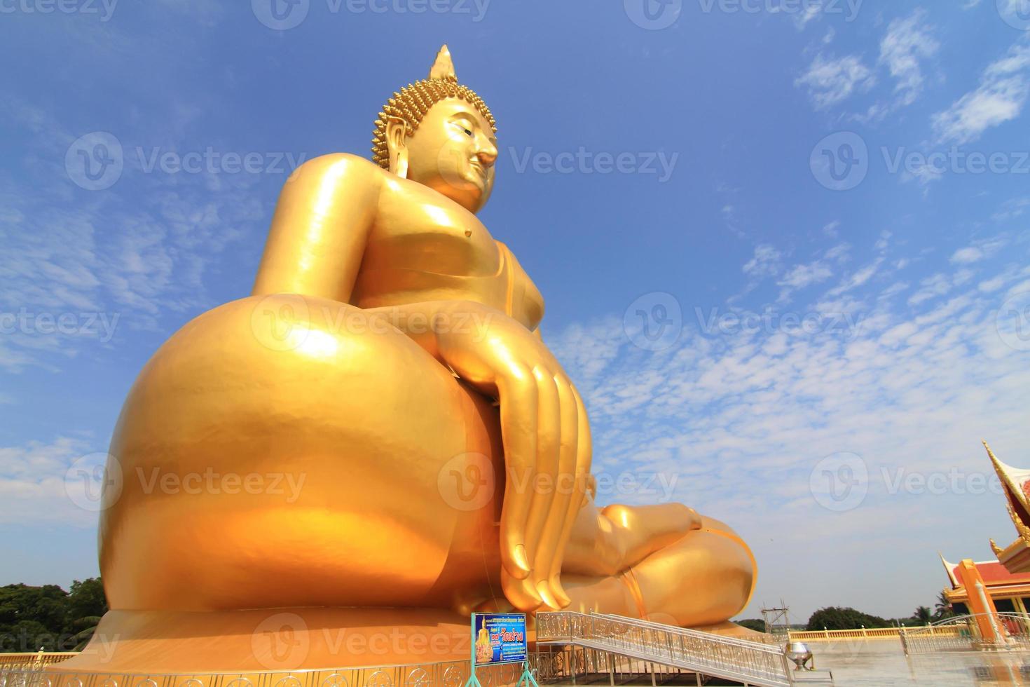 Big Buddha image on blue sky background photo