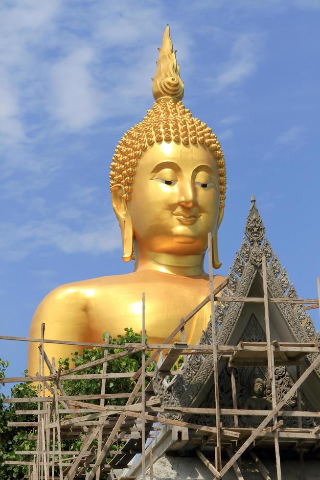 Big Buddha image on blue sky background photo