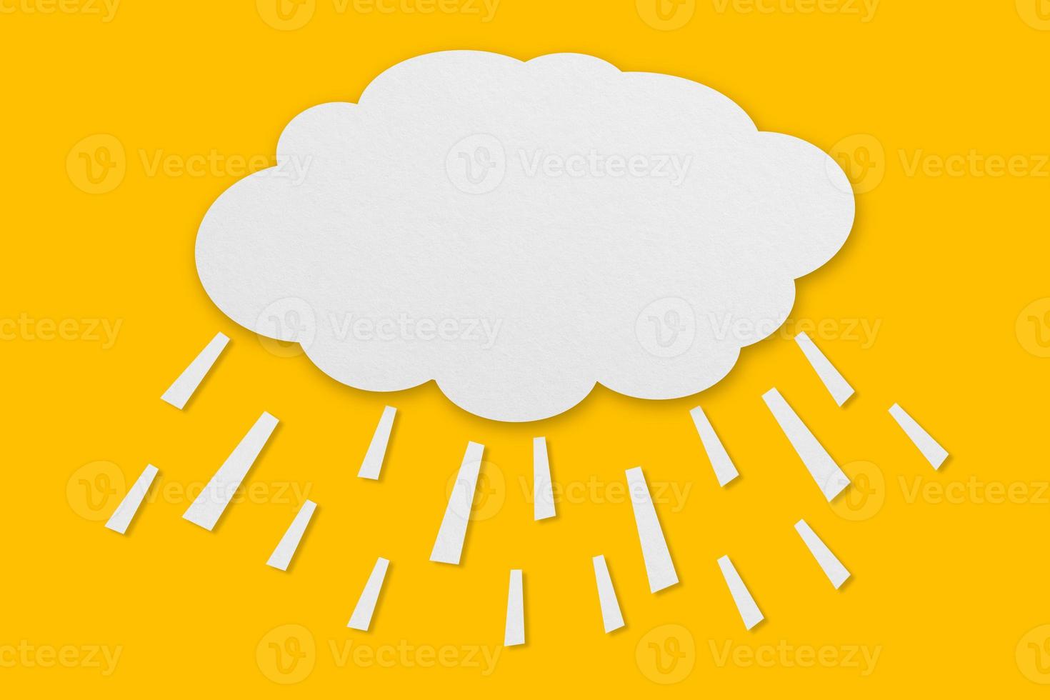 cloud and rain paper white paper cut and paste paper Speech balloon on yellow background. photo