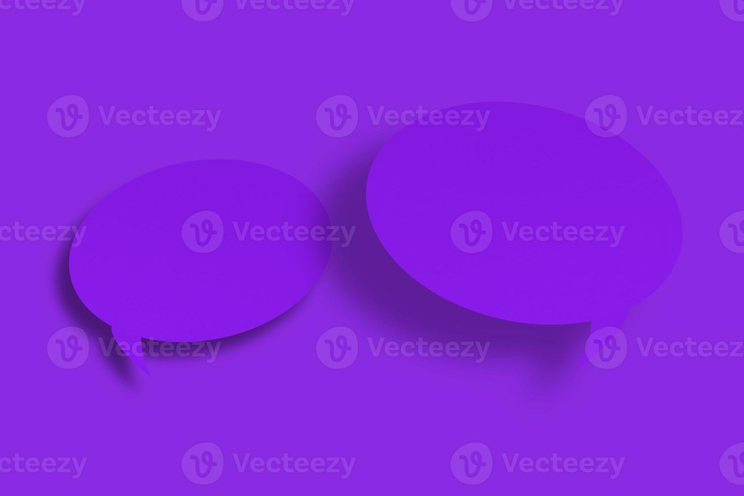 Purple paper in the shape of speech bubbles against a purple background. Communication bubbles. photo