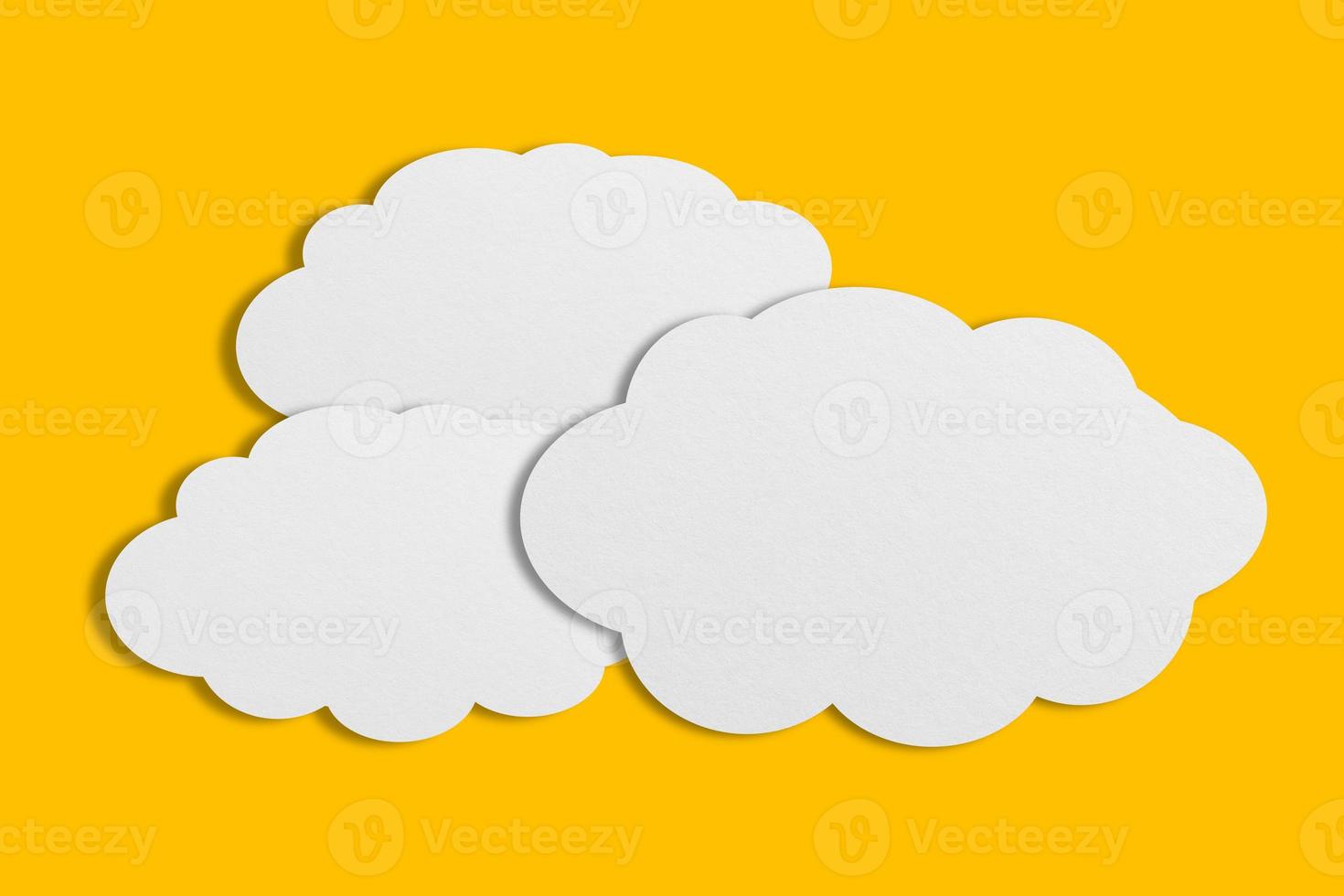 white cloud paper speech bubble on yellow background photo