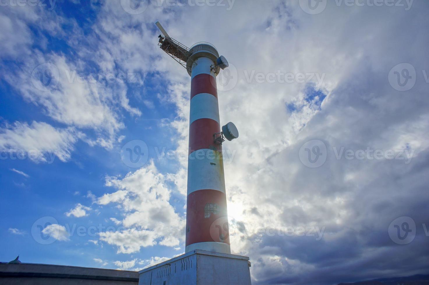 Red and White Lighthouse photo