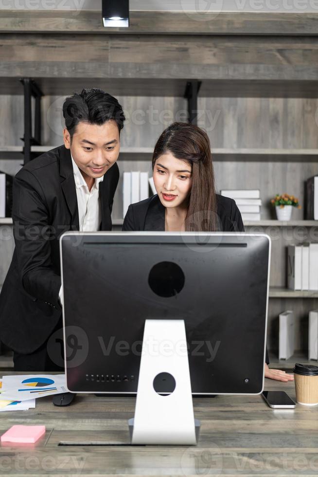 Business Corporate team brainstorming, Planning Strategy having a discussion Analysis investment researching with chart at office. Business meeting concept photo