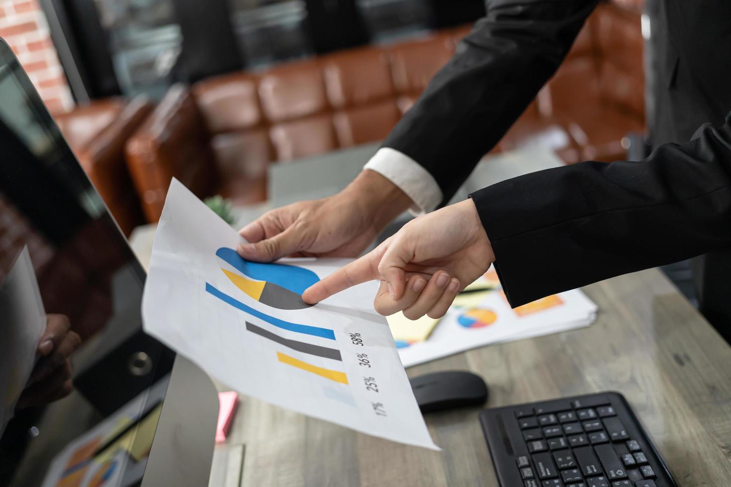 Business Corporate team brainstorming, Planning Strategy having a discussion Analysis investment researching with chart at office. Business meeting concept photo