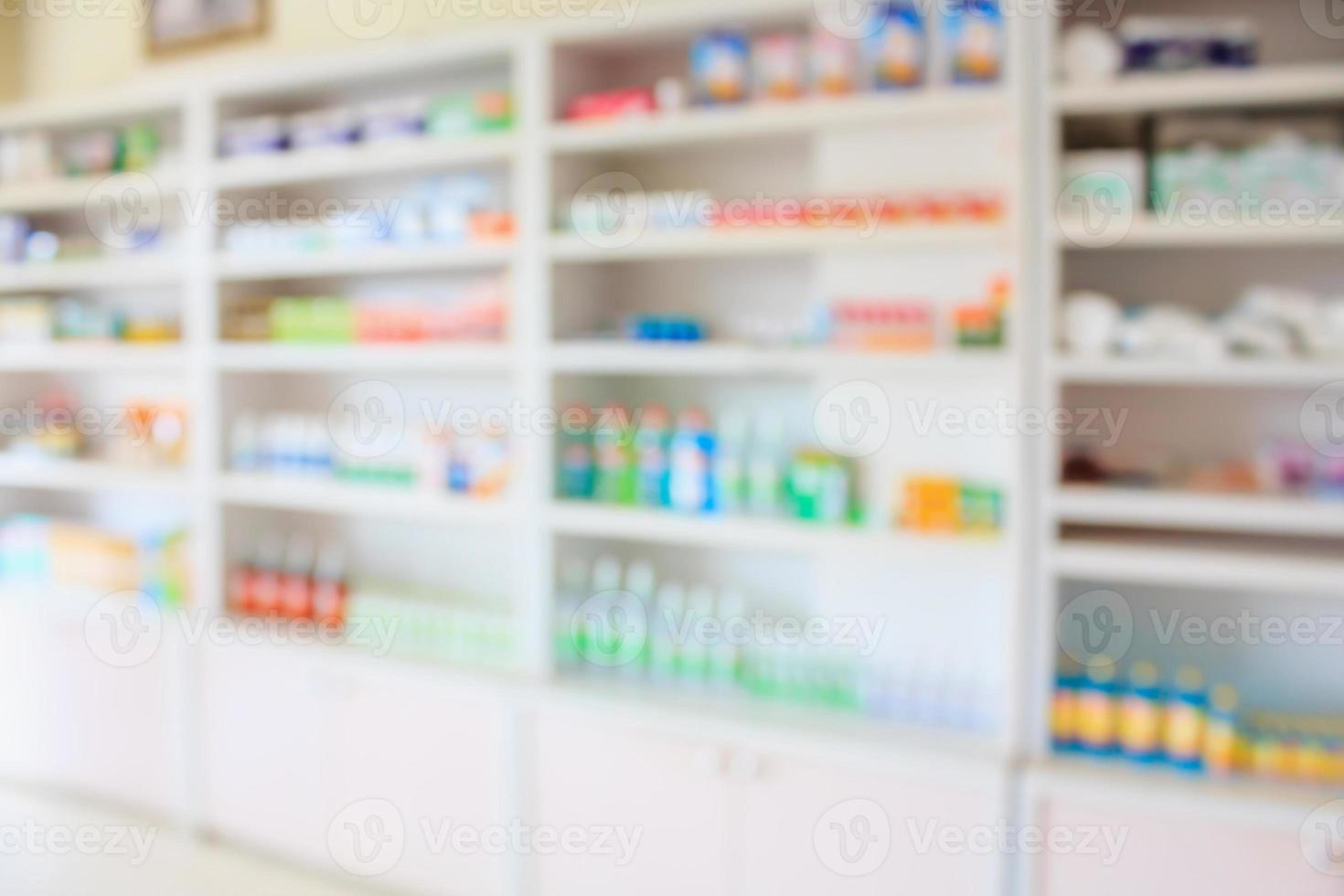 pharmacy shelves filled with medication blur background photo