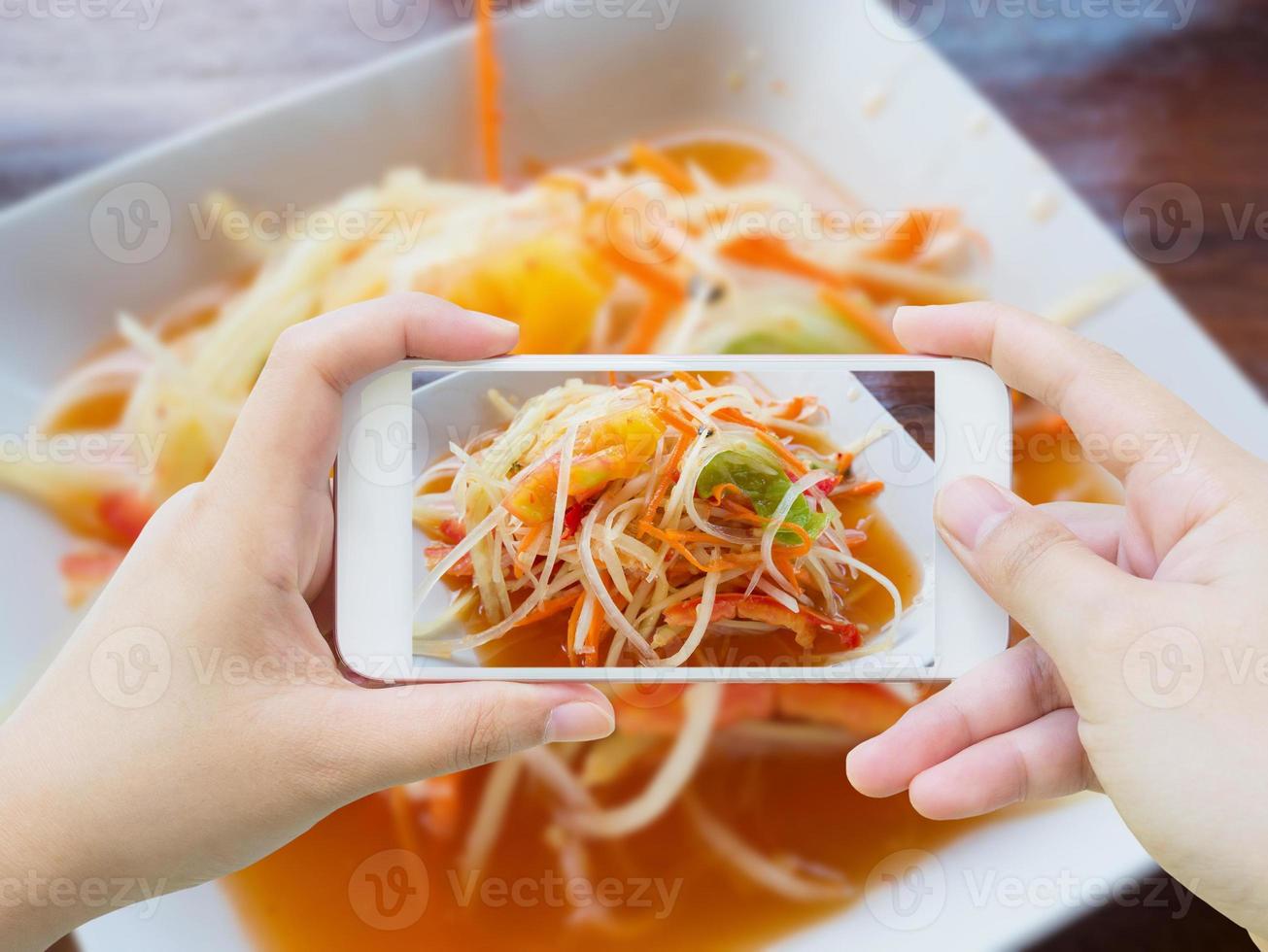 Taking photo of Thai papaya salad