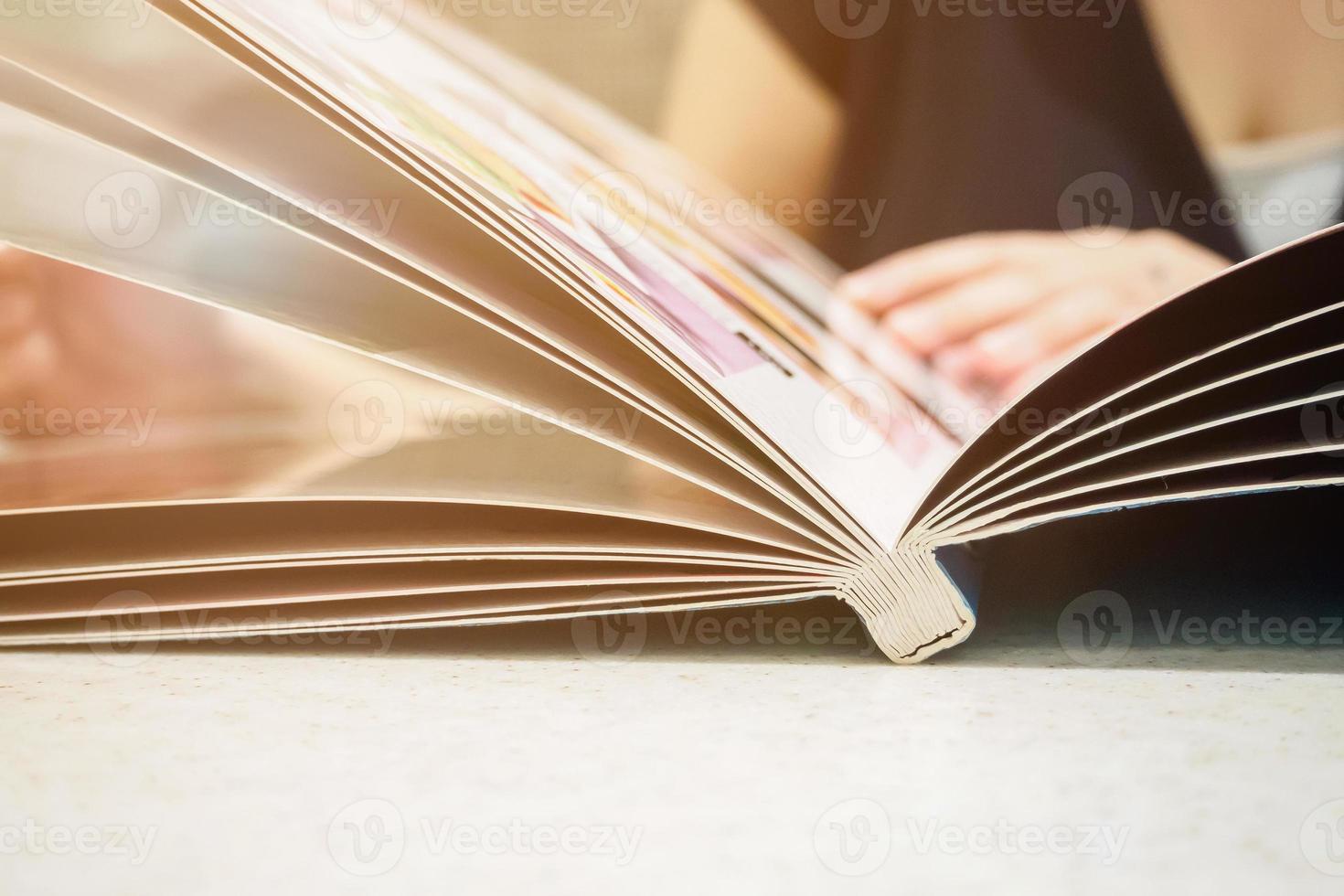 Beautiful young asian woman with menu in restaurant photo