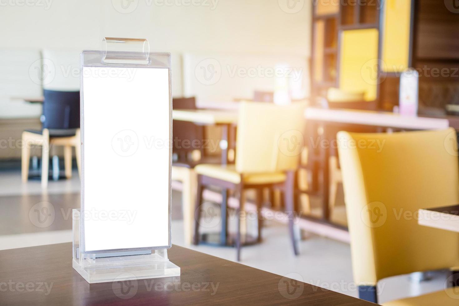Mock up Blank white menu frame on cafe restaurant table photo