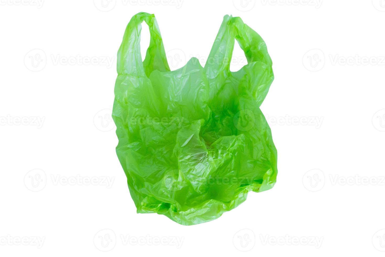 green plastic bag isolated on white background with clipping path photo