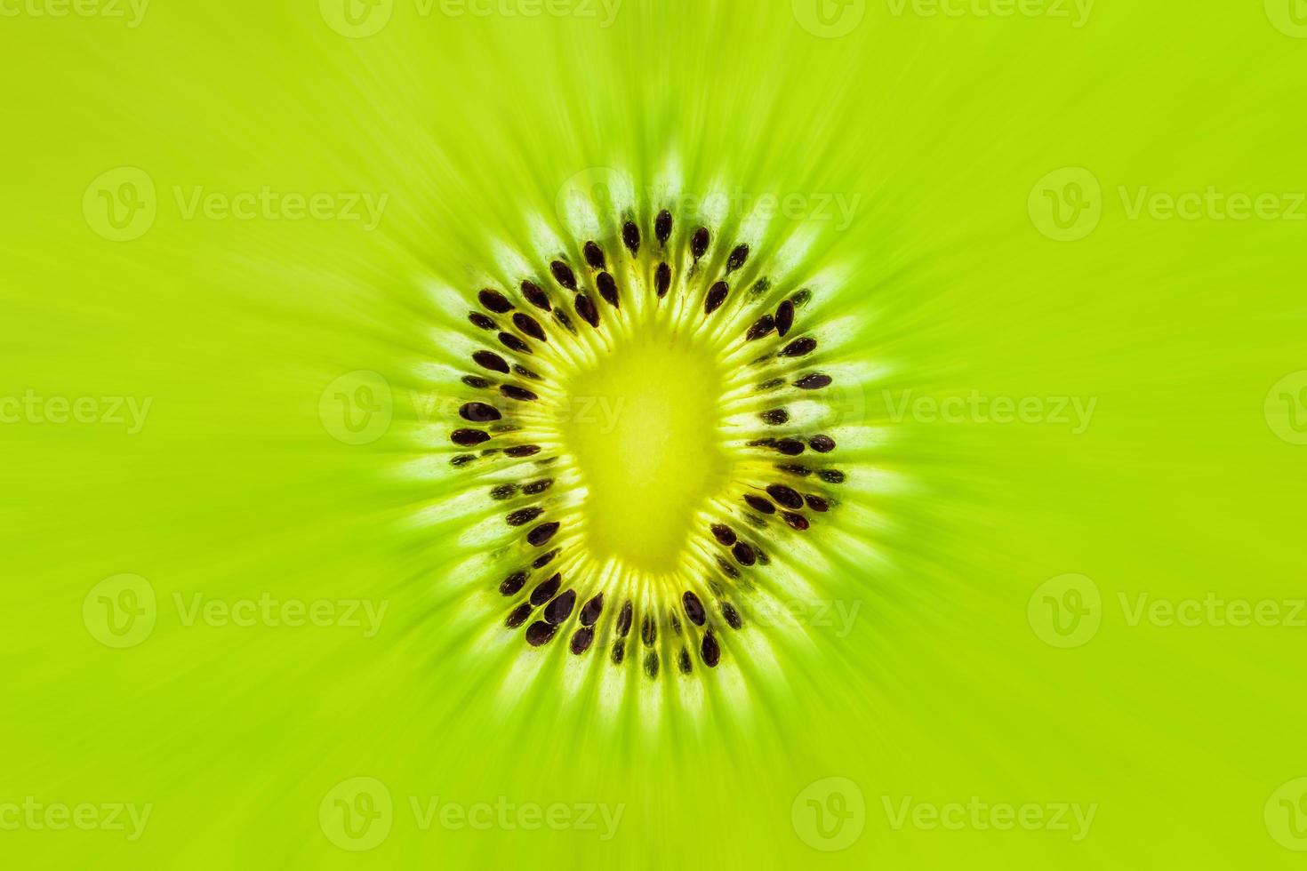 Fresh kiwi fruit slices closeup macro texture background photo