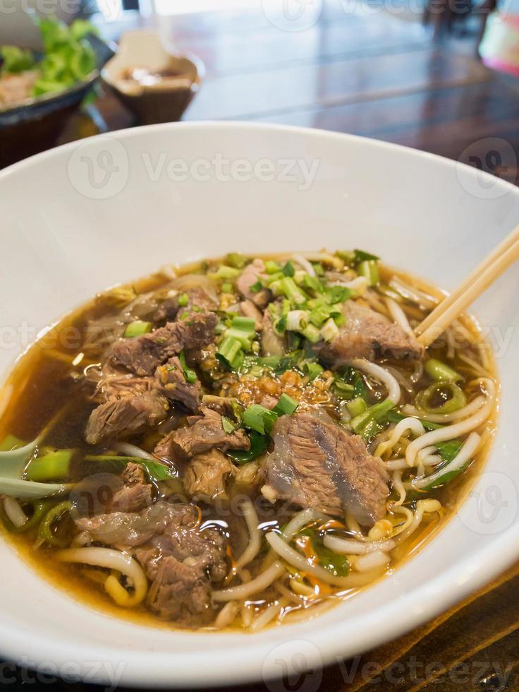 Noodles with Beef Stew Soup 8906412 Stock Photo at Vecteezy
