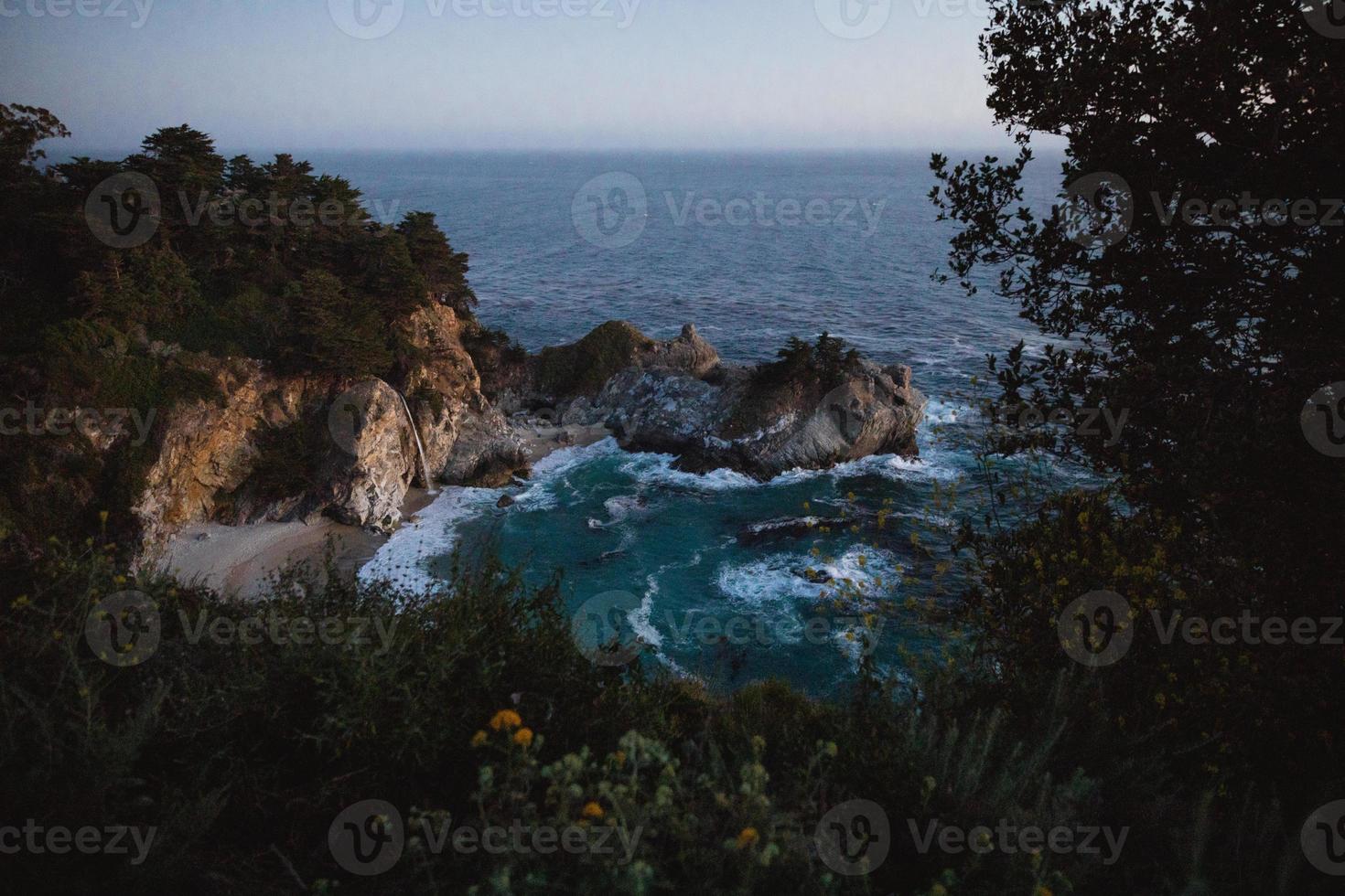 Moody night on the ocean photo